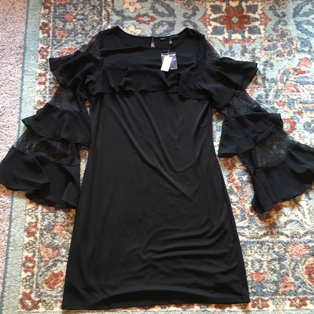 Brand New! Black dress with decorative sleeves